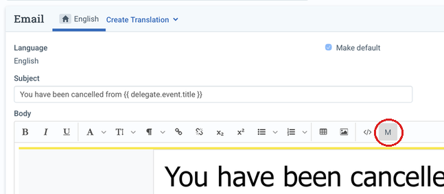 The M icon in the template editor toolbar